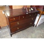 A Stag dark Mahogany chest of two long and two short drawers, 42" wide x 18 1/4" deep x 28" high.