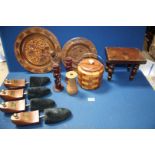 A quantity of treen including a biscuit barrel, wall plaques, shoe shapers by Cheaney,