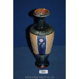 A Royal Doulton footed vase with panels of a single rose on blue ground pattern with green mottled