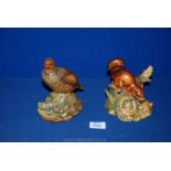 Two figures by Kowa - Partridge and a Squirrel; (small chip to ear and leaf broken off,