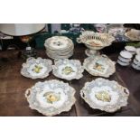 A dessert service with hand painted fruit including thirteen plates, compote dish, serving dishes,