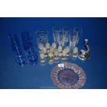 A box of glass to include; four large blue and two small Caithness tumblers,