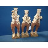 An unusual antique pottery group of three bandsmen; colonial north or central Africa,
