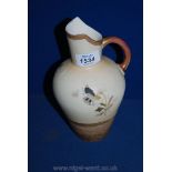 A Robert Hanke porcelain ewer, hand painted with floral decoration, mark 1900-1918, 20 cm tall,