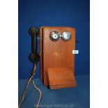 A 1920's wall telephone.