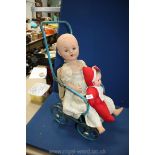 Two old dolls and a dolls pushchair, all a/f.