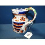 A very early Mason's Ironstone 'Hydra' jug with unusual spread legged handle;