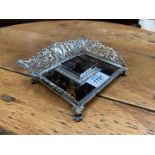 A most appealing tortoiseshell and silver Inkstand having a square recess for an inkwell,