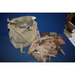 A canvas bag of rabbiting/ferreting kit, nets etc.