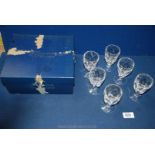 A boxed set of six Waterford crystal sherry glasses.
