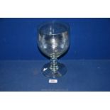 A large Romanian engraved glass goblet.