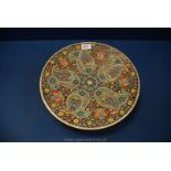 A colourful Persian charger with intricate mosaic style decoration 13" diameter.