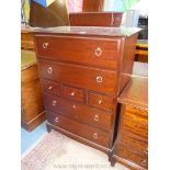 A Stag dark Mahogany Tall Boy of four long and two short drawers,