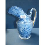 A large Victorian blue and white pottery water jug.