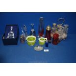 A quantity of coloured and clear glass including Cranberry jug and sugar shaker,