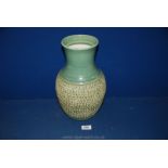 A German bulbous vase in green with embossed base. Approx 13" tall.