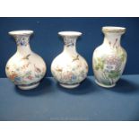 Three decorative Chinese porcelain vases.