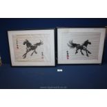 A pair of oriental embroidered silk pictures of horses; frame as found and some marks to the silk.