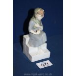 A continental porcelain figure of The Little Match Girl,