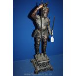A bronzed figure of a man with sword, a/f. 24" tall.