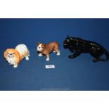 A Sylvac Pekinese and Bulldog plus an unmarked Black Panther with green glass eyes.