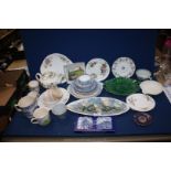 A box of china to include blue and white plates, saucers, a Wedgwood teapot, green dish,