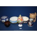 A quantity of china including a Sylvac pumpkin jug, Wade heath bowl, Toby jug,