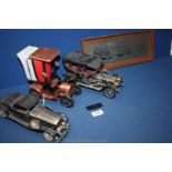 A tray of three replica model cars,