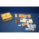 A quantity of miscellanea to include; cigar box and cigars and a quantity of cigarette cards.