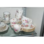 A Royal Crown Derby Teaset, in ''Derby posies'' design to include six cups and saucers, six plates,