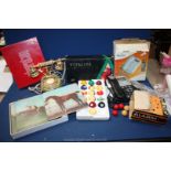 Two boxes of billiard balls (not complete), table mats and silver plated coasters,