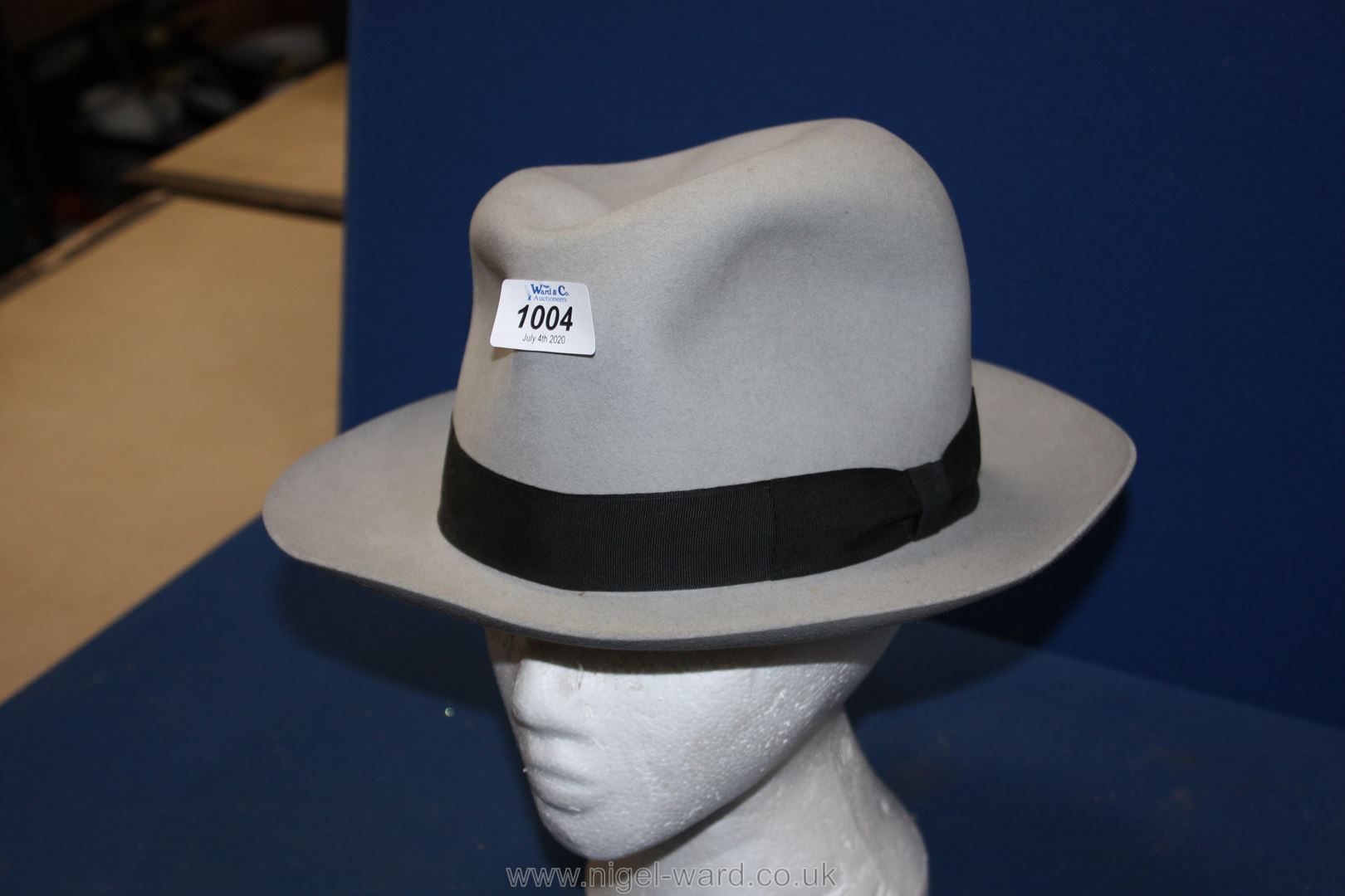 An Austin Reed grey felt trilby Hat, 6 3/4".