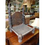 A most unusual low Prayer kneeler/Chair having a woven cane seat,