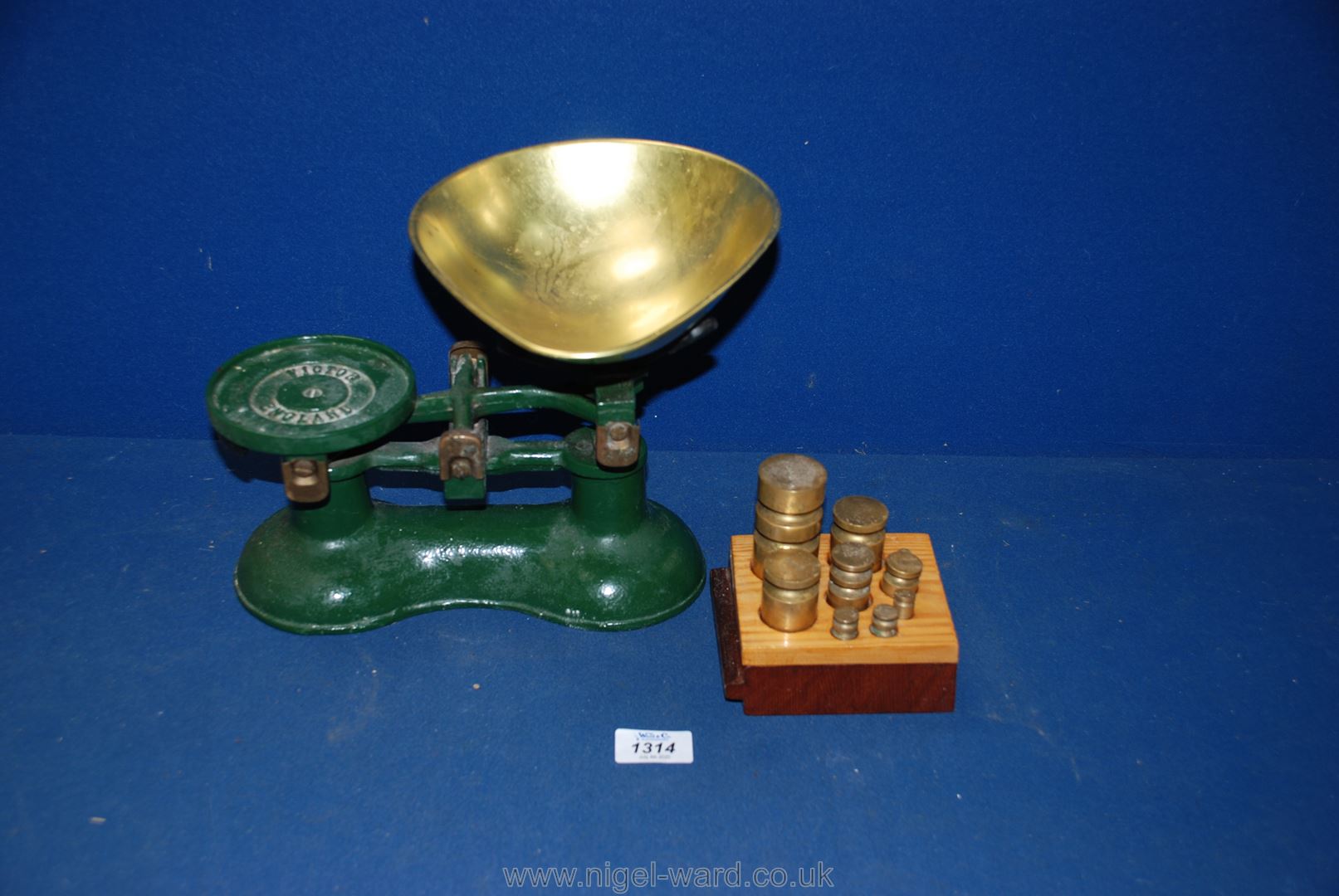A pair of Victor weighing scales and box set of weights.