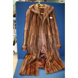 A Ladies brown mink coat.
