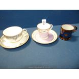 A Royal Worcester cup and saucer in the Portia pattern,