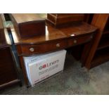 A bow fronted Mahogany Side Table having two frieze drawers,