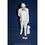 A Royal Doulton figure 'Winston Churchill'. 11" tall.