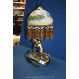 A brass lady Art Deco style figure Lamp with fringed glass shade.