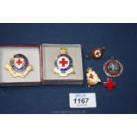 A life member British Red Cross society badge , having safety chain and other Red Cross badges,