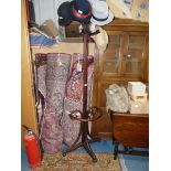 A dark stained Bentwood Hat and Coat Stand, for standing against a wall,