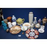 A quantity of china including oriental plates, vases, teapot, Delft vase, Dog of Fo, nursery plate,