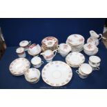 Three part teasets including: Staffordshire 'New Chelsea', Tudor with gold and red floral pattern,