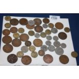 A quantity of old pennies, threepences, two shilling pieces, shillings, etc.