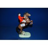 A Beswick Huntsman, a/f (horse having chipped ear and two broken legs,