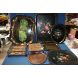 Five tin trays with floral and other designs,