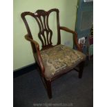 An attractive Georgian design Mahogany framed elbow Chair having carved detail back with