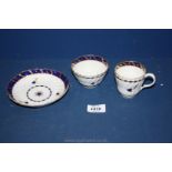 A Flight Worcester Trio in spirally fluted Blue Bell pattern comprising tea bowl,