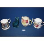 A Mr Pickwick tankard, Hammersley loving cup, Sadler jug and a Poole pottery cat.