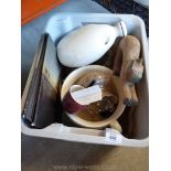 A box of miscellaneous china, hot water bottle etc.